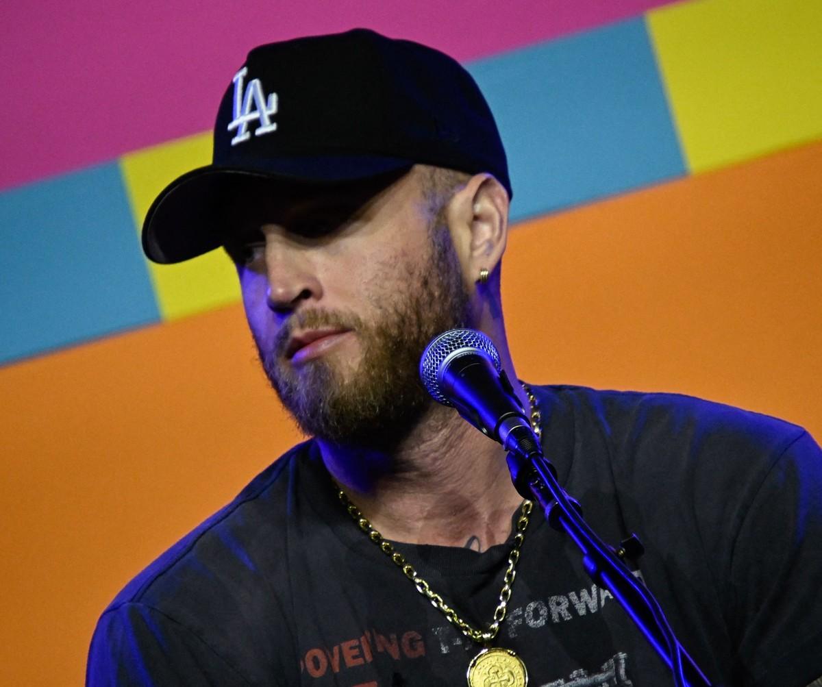 Joel Madden listened as Chet urged parents to help their children develop their own identity.