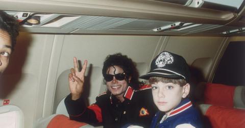 Michael Jackson on an airplane with an adolescent friend James Safechuck