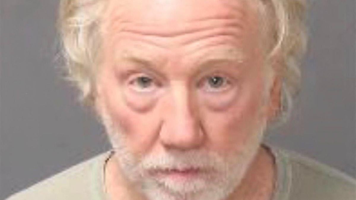 A mugshot of Timothy Busfield