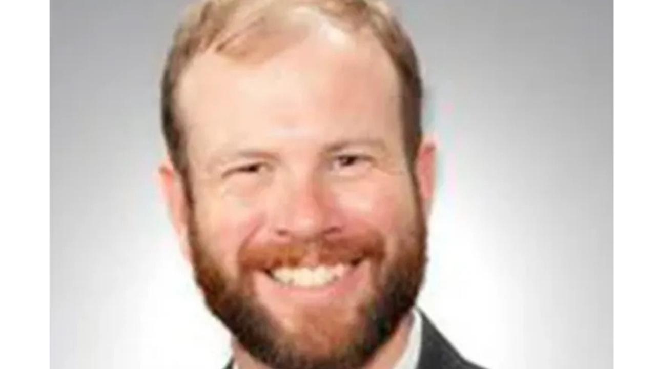 Dr. Evans' attacker was found in a neighbors' backyard.