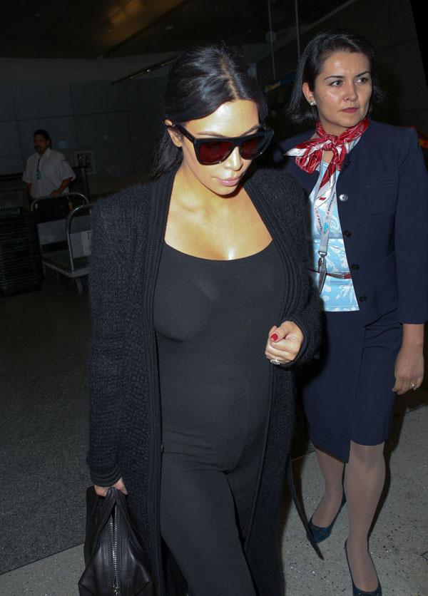 kim kardashian pregnant bump changing