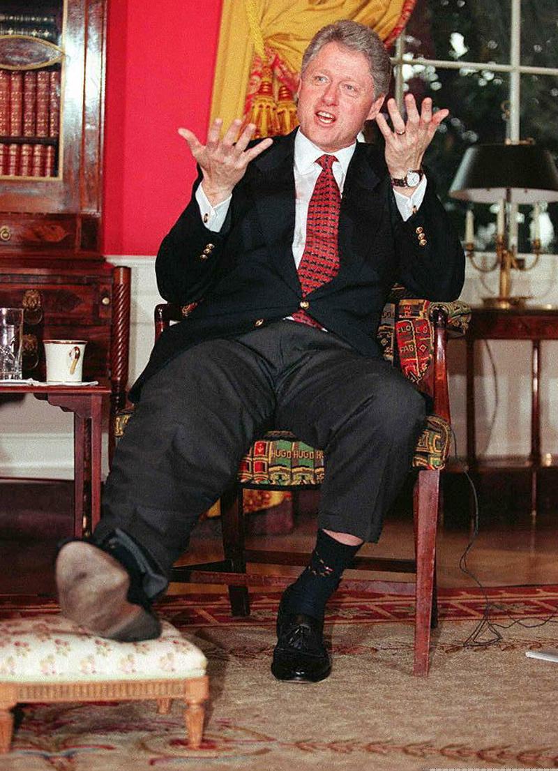 8 Ridiculous Pictures Of Bill Clinton Manspreading