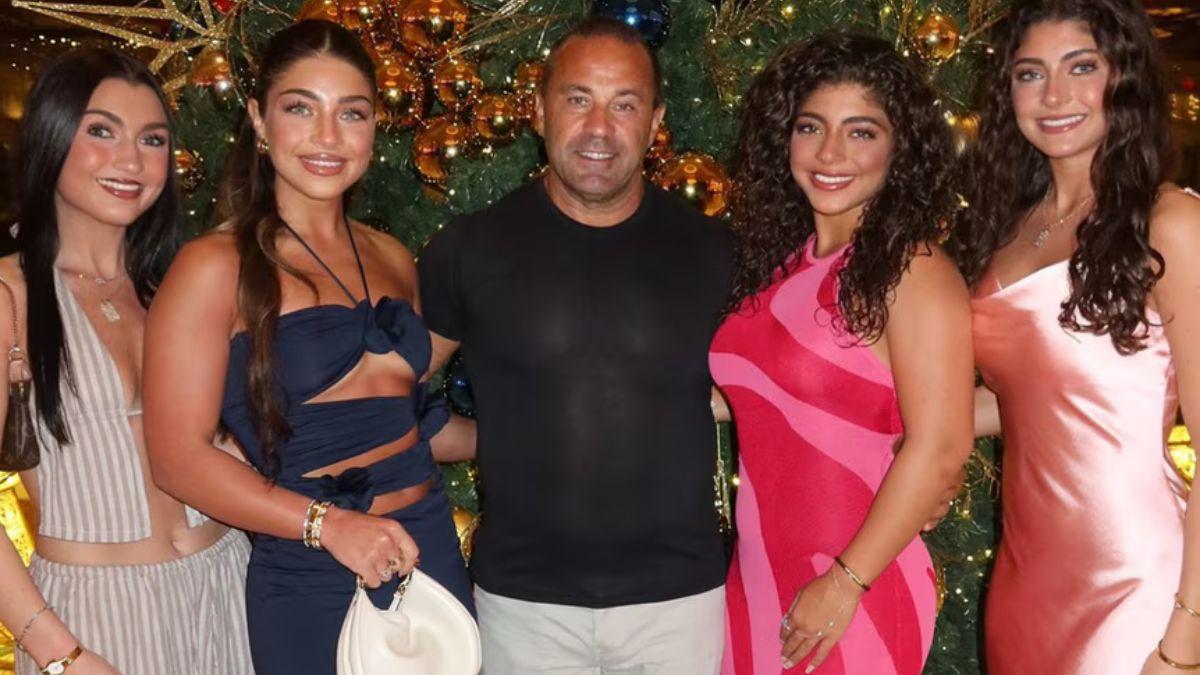 A photo of Joe Giudice with his daughters