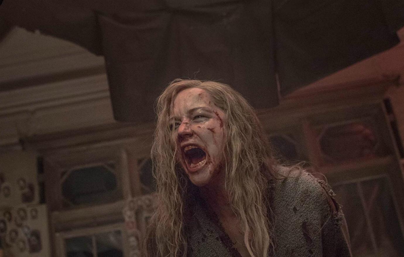 Jennifer Lawrence was disheveled in a torn sweatshirt with frizzy and bloodied hair in a still from the horror movie mother!