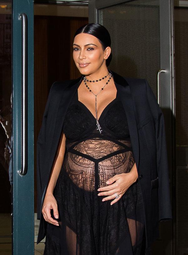 Pregnant Kim Kardashian shows off ample cleavage in sheer top on