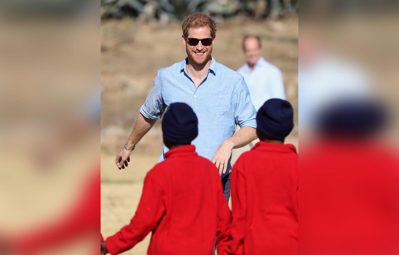 Prince Harry Plays With Children