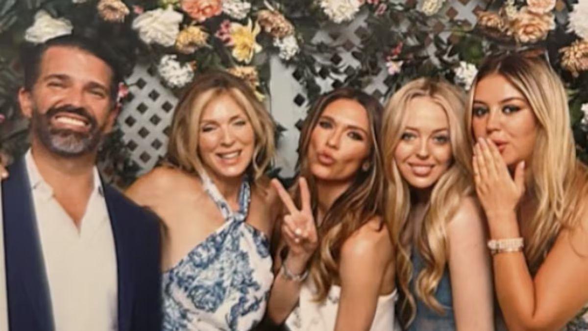 Image of Marla Maples smiled wide between fiancés Donald Trump Jr. and Bettina Anderson.