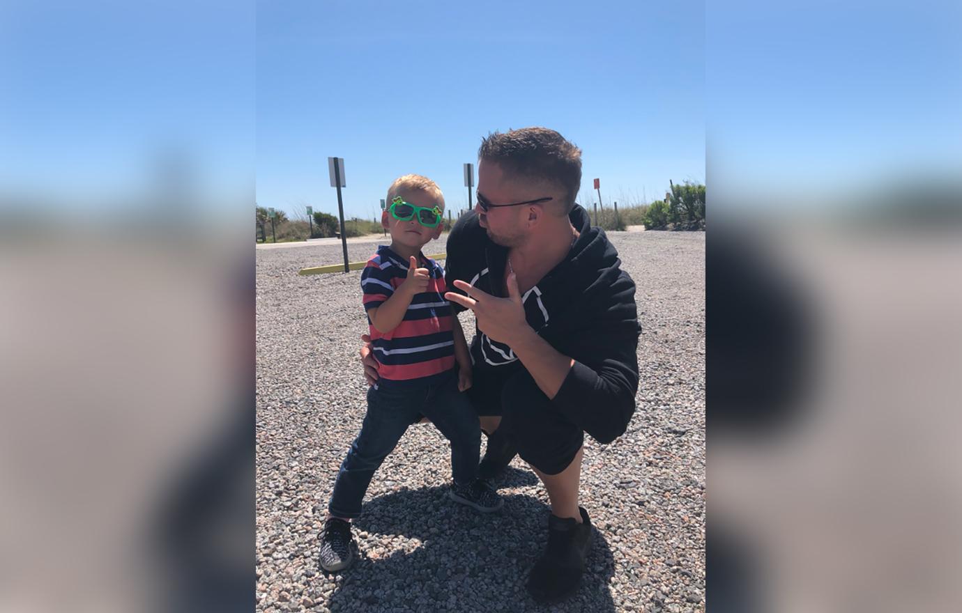 Nathan Griffith Poses With Son Kaiser