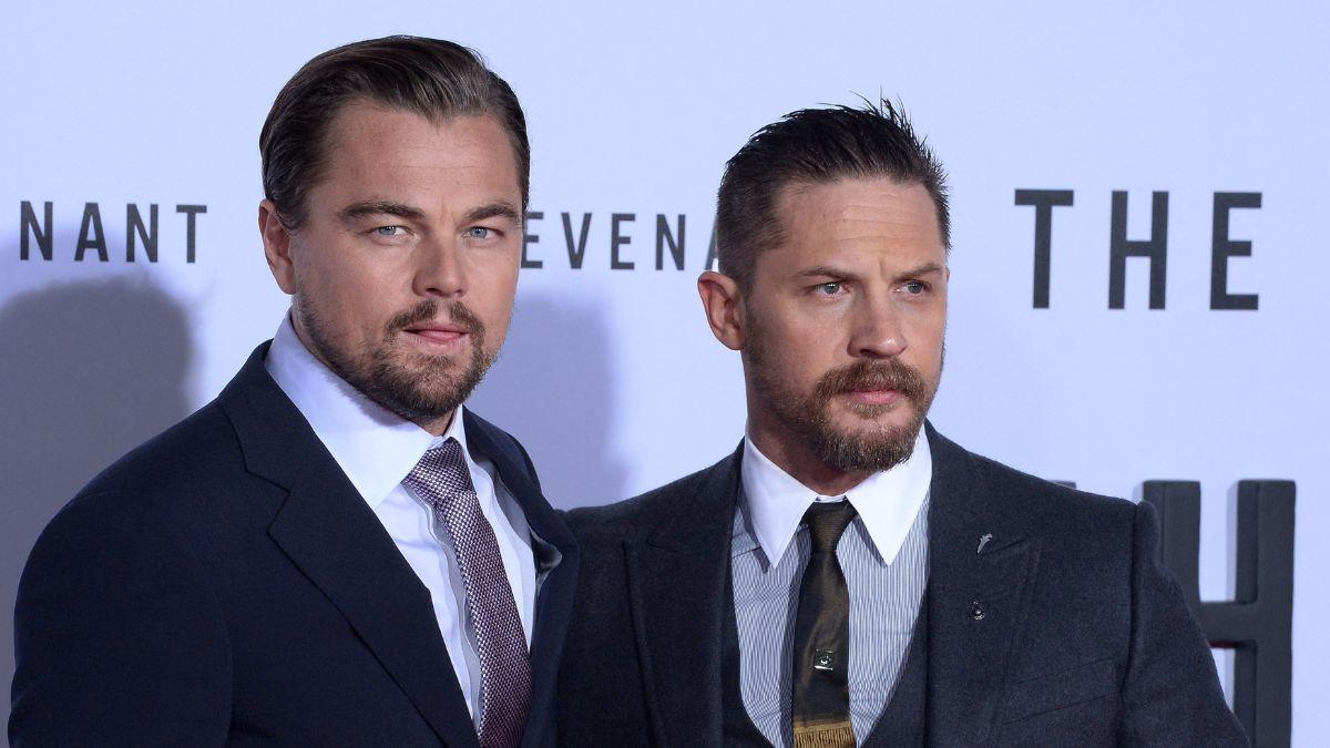 Leonardo DiCaprio won a bet with Tom Hardy, leading the actor to tattoo 'Leo Knows All' on his bicep.