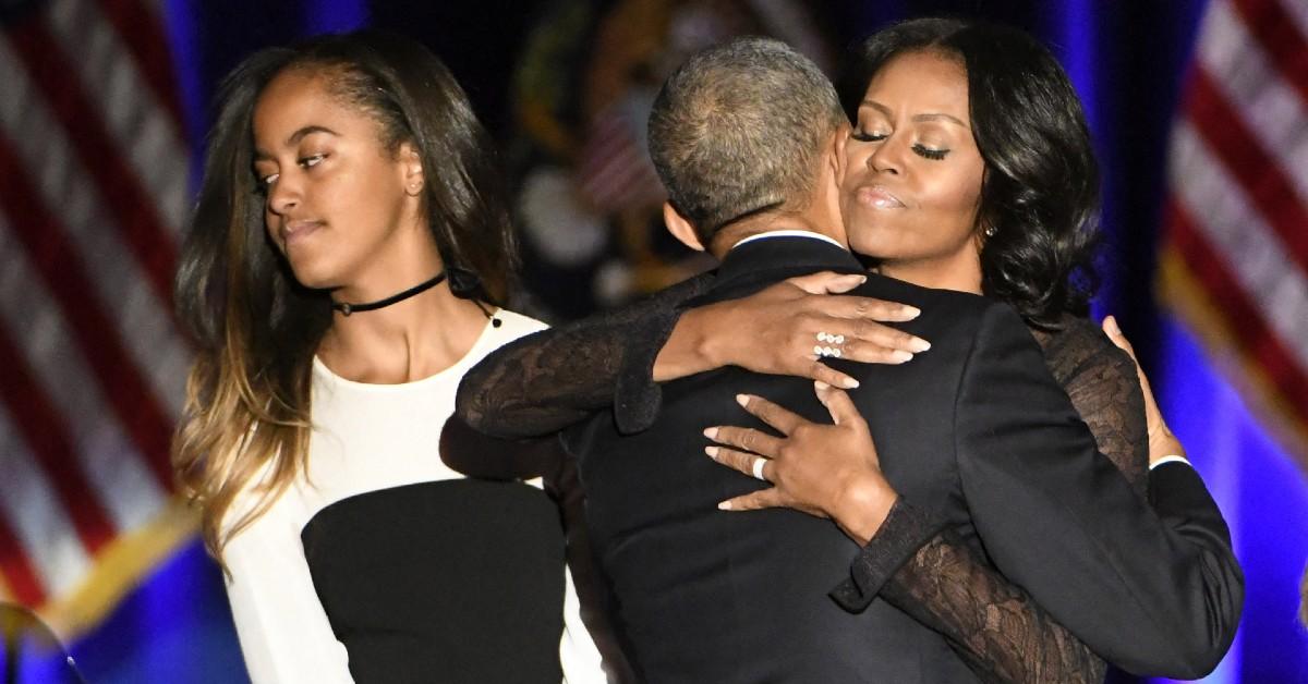 Photo of Malia, Barack and Michelle Obama