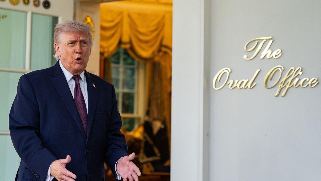 A photo of Donald Trump outside of the Oval Office