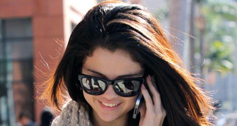//selena gomez giggling phone post