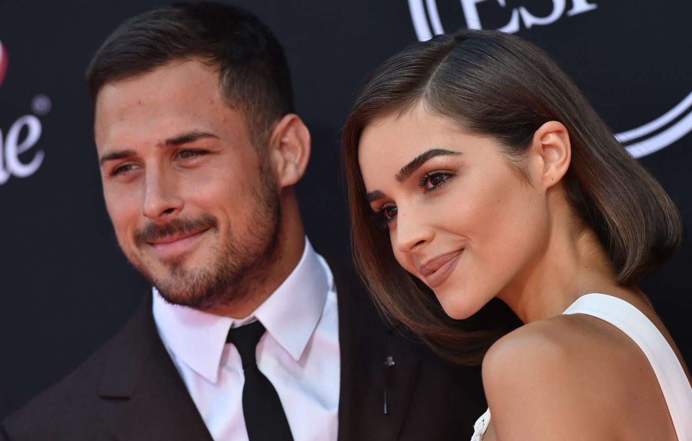 Former Miss Universe Olivia Culpo was seen with her then-boyfriend, Danny Amendola, before they suffered their own 2018 celebrity cheating scandal.