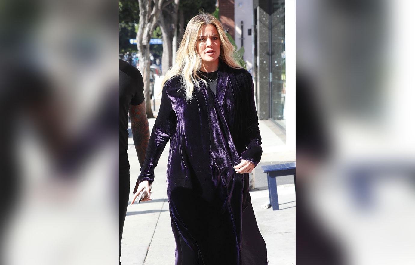 //khloe kardashian baby bump pregnant hiding belly