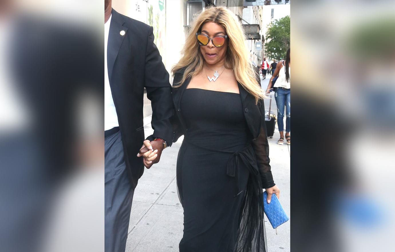 Wendy Williams Wearing Black Visits A Young Mystery Man's Apartment