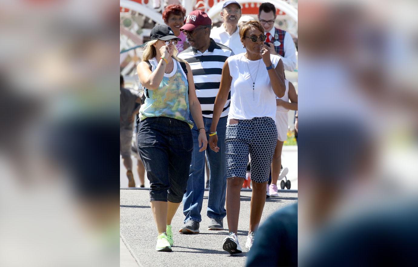 Robin Roberts and her wife Amber Laign have on a day out at Disneyland. Robin was seen riding the radiator springs racers and enjoying lunch at the Carthy Circle restaurant.