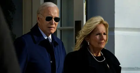 joe biden mocked after jill biden had to lead him off stage