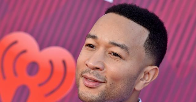 John Legend arrives at the 2019 iHeartRadio Music Awards which broadcasted live on FOX at Microsoft Theater on March 14, 2019 in Los Angeles, California.