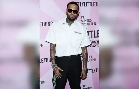 chris brown housekeeper submits injury photos evidence lawsuit million see