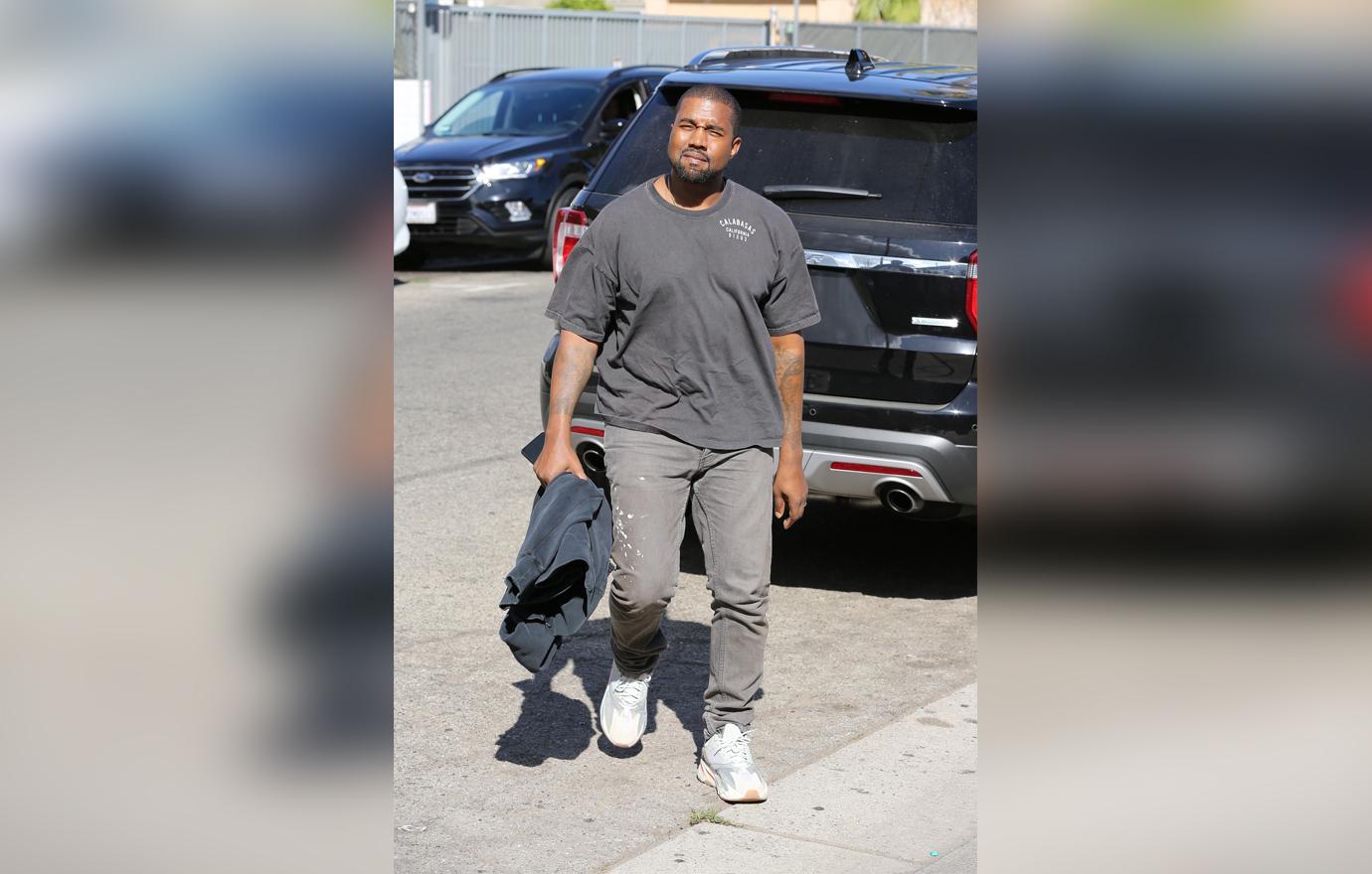 //kanye west hires kardashian trainer lose weight