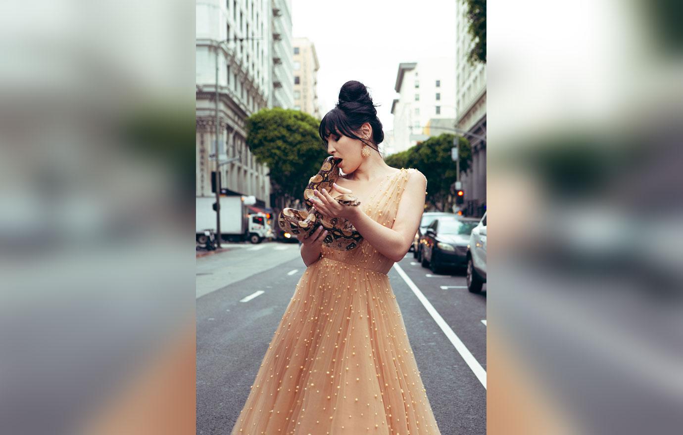 Trans Model Plastic Martyr Standing in The Street In Pearl Studded Sheer Dress Holding Snake