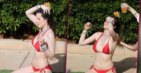 Bella Thorne Reveals Bushy Armpits While Washing Hair With Beer