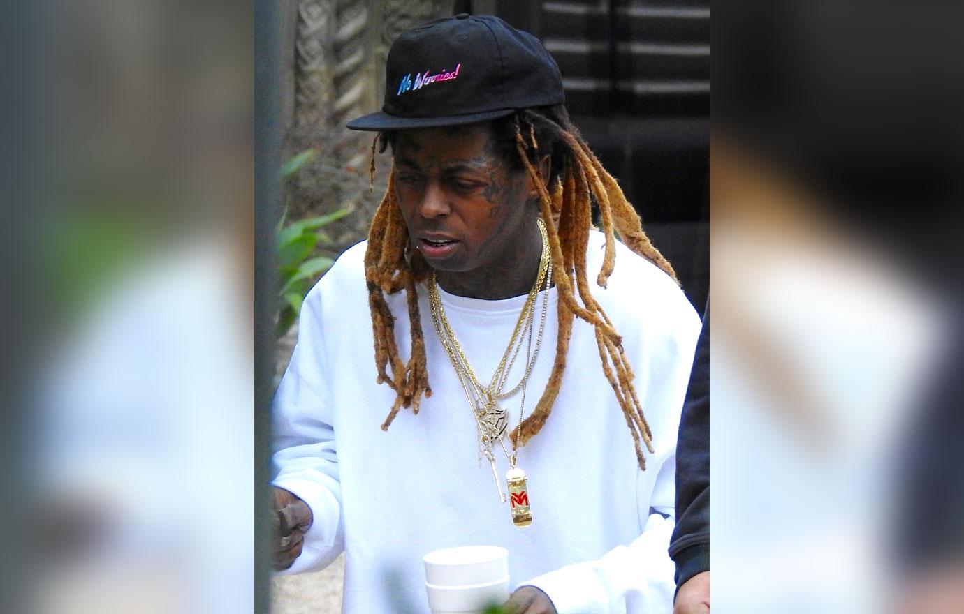 lil wayne  million lawyer lawsuit unpaid debt cash money