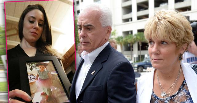 Inset Casey Anthony holding Photo of Her Daughter Caylee Anthony, George and Cindy Anthony