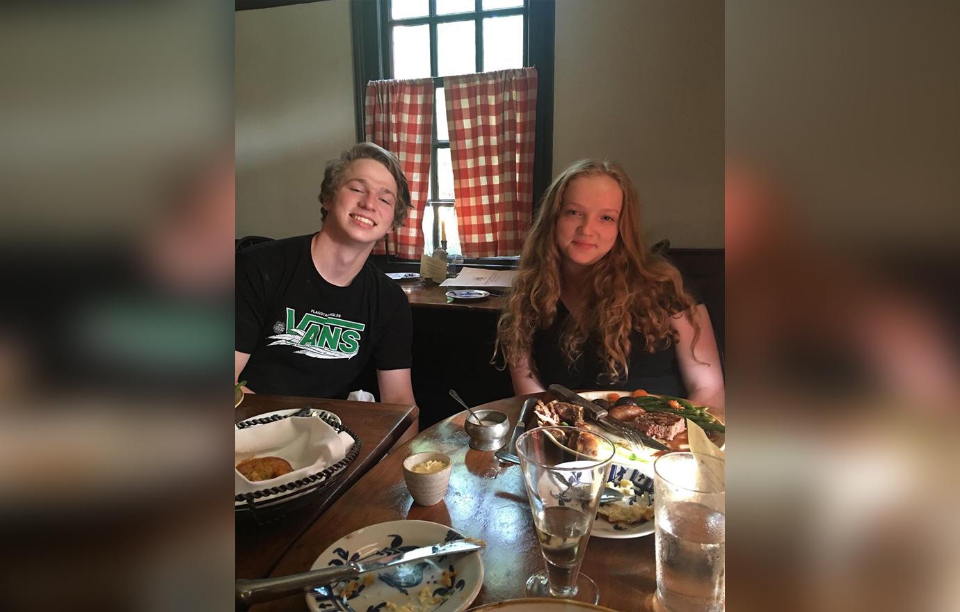 Meri Brown takes a photo of her kids seated across the dinner table