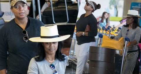 //queen latifah at airport with girlfriend