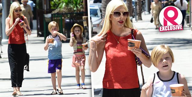 //tori spelling gives candy children behave front cameras wide