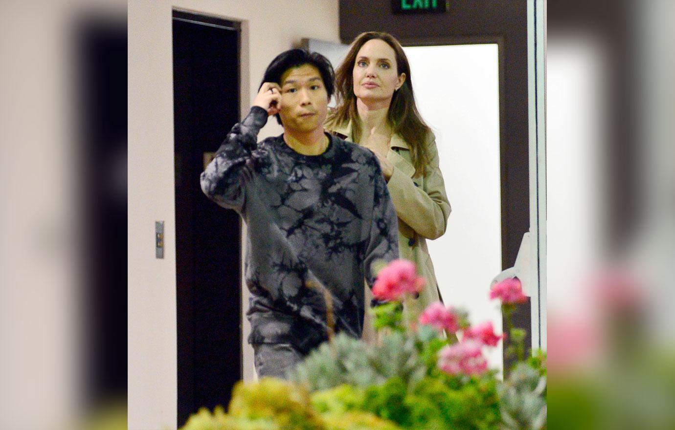 A make up free Angelina Jolie spends the night with her son Pax as they leave sushi park restaurant in West Hollywood.