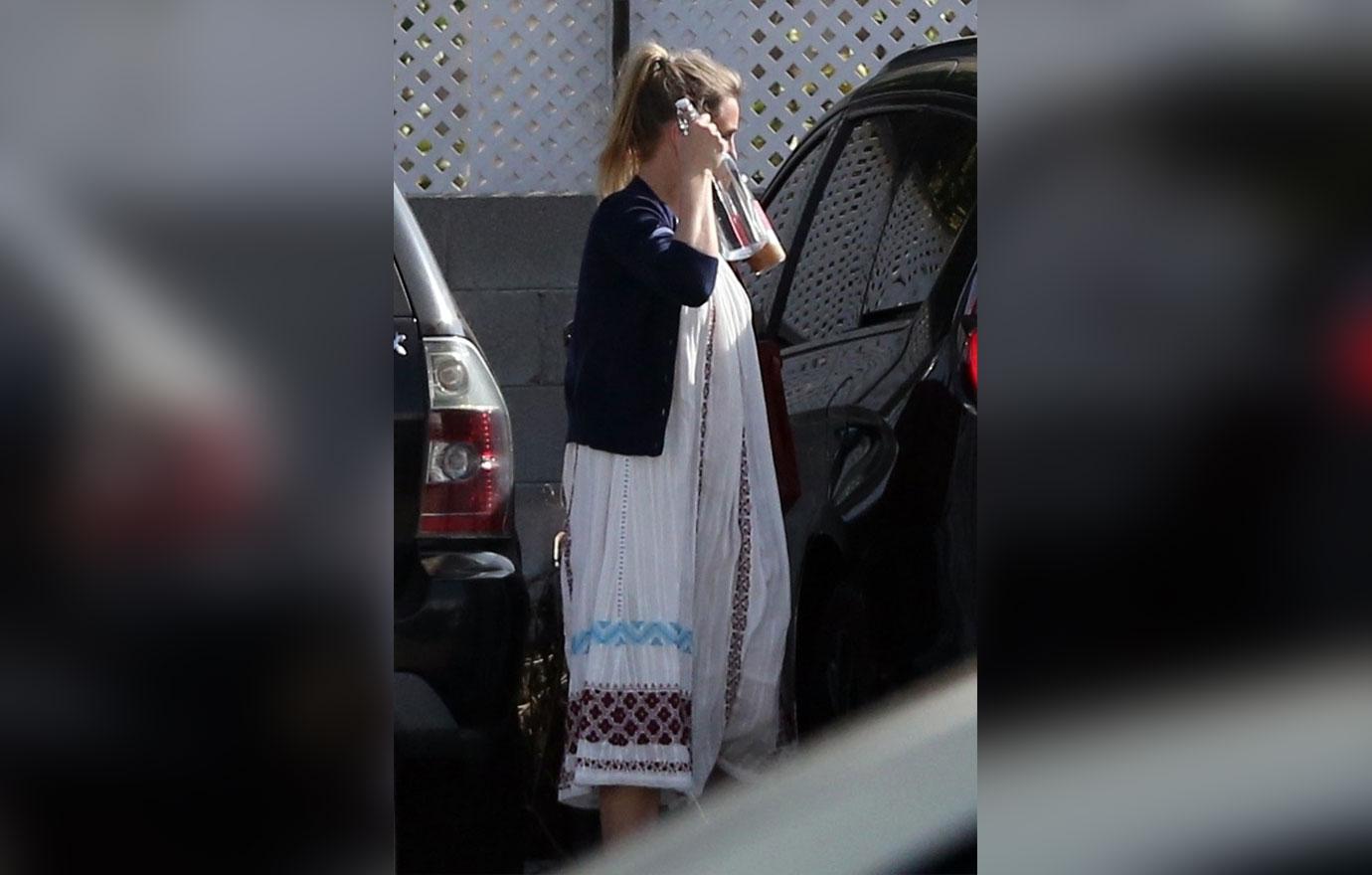 Cameron Diaz Desperately Trying To Hide Baby Bump In Grotesquely Oversized Clothes