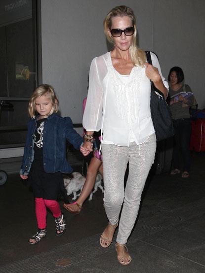 A Slim Jennie Garth Arrives At LAX Airport With Her Daughters