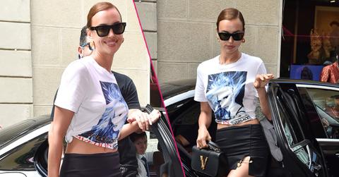 Irina Shayk wears a white shirt with silk screen print with the singer Blondie's face on it.