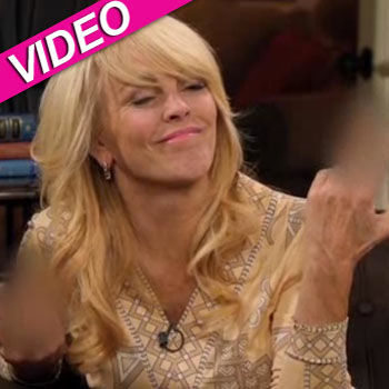 //dina lohan flips off camera