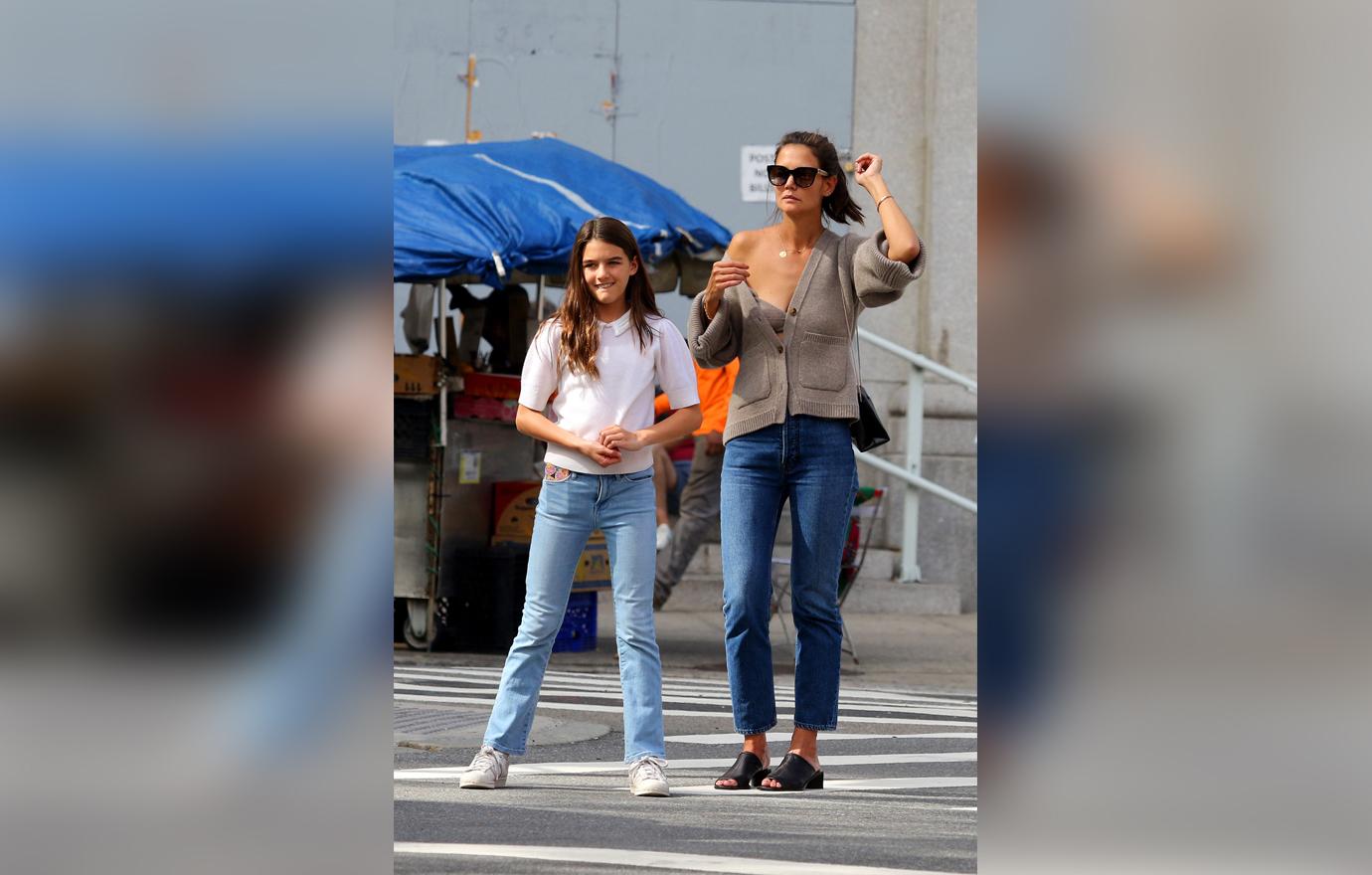 Katie Holmes Flaunts Cleavage in Loose Gray Sweater and Matching Bra Walking With Daughter Suri Cruise