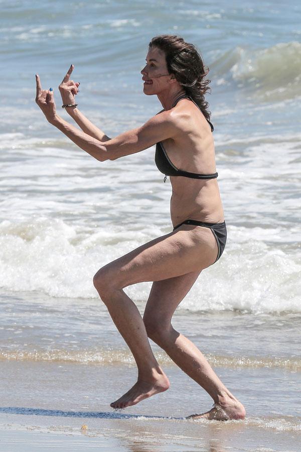 Janice Dickinson Giving The Middle Finger Bikini Photos