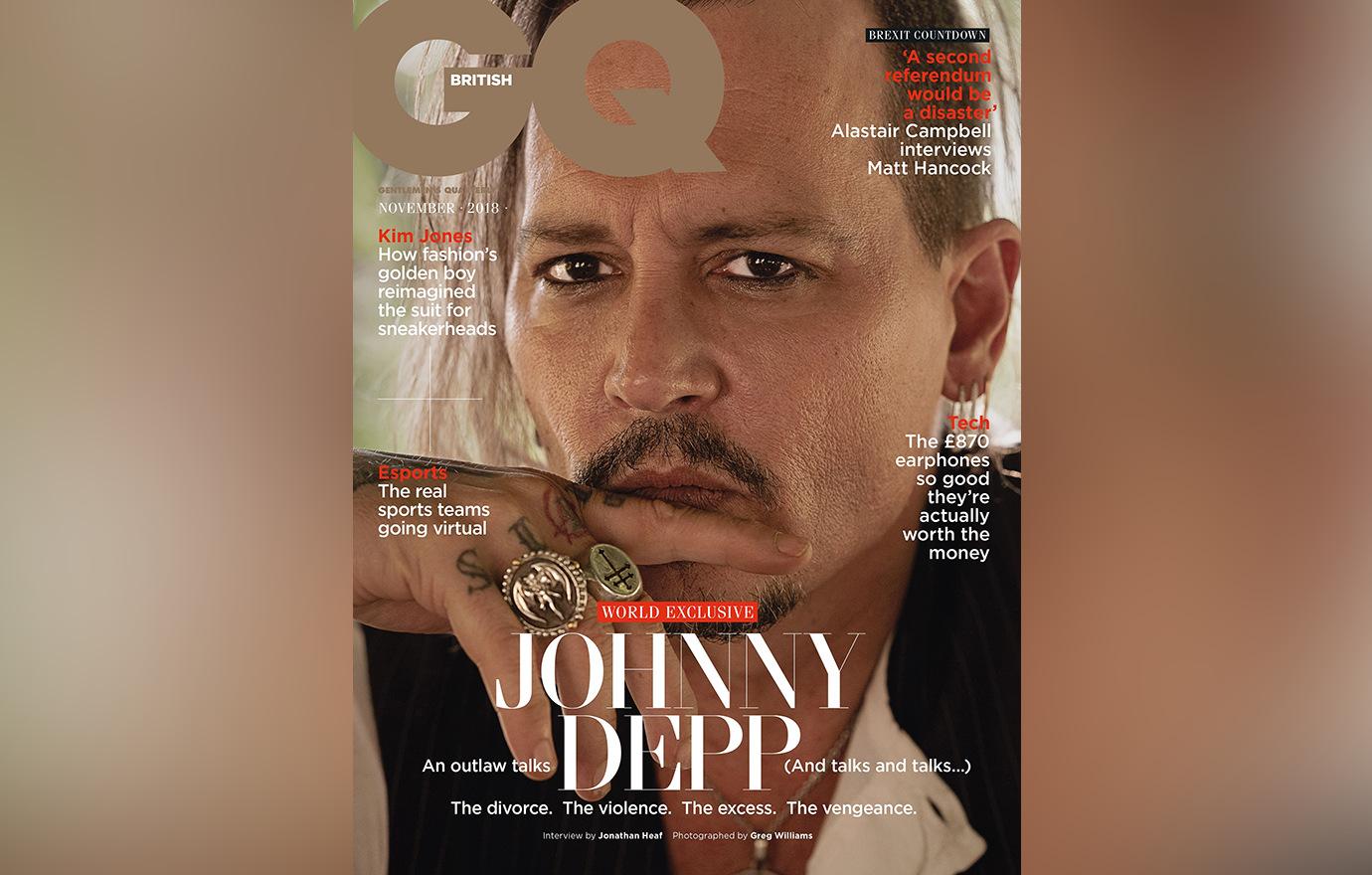 Johnny Depp was ready for his close-up on the cover of British GQ. His hands were covered in rings and tattoos.