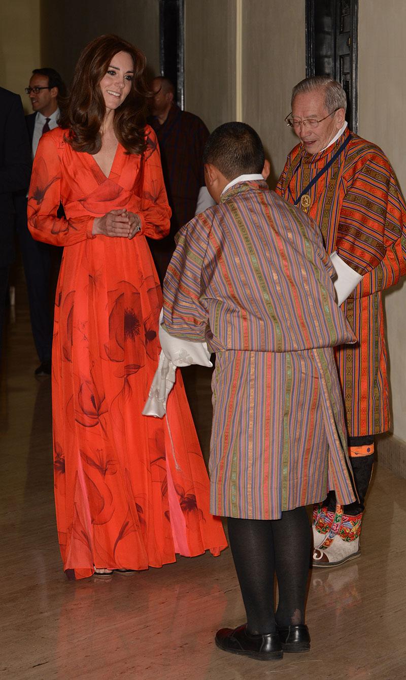 //kate middleton bhutan red dress skinny baby bump