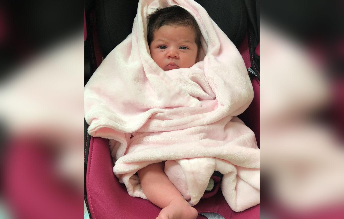 Ariana Sky Magro wrapped in a blanket.