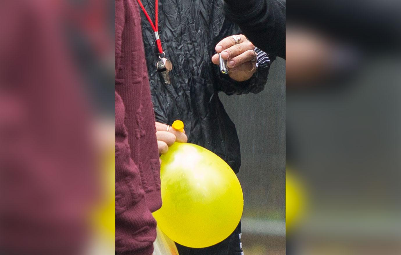 Jude Law's Son Rafferty Inhales Balloon At Carnival