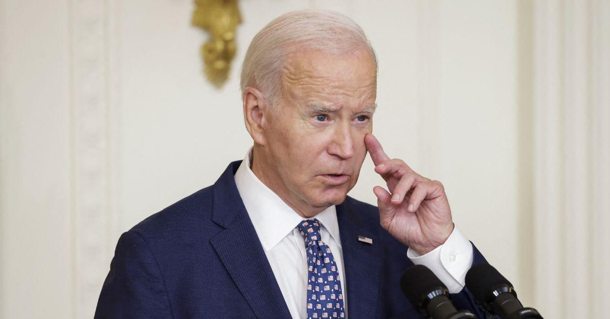 armed protestor outside joe biden delaware home motorcade passed by jpg