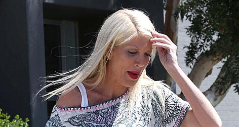 //tori spelling hospitalized with migraines square