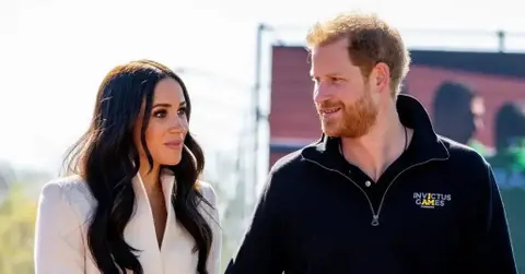 prince harry and meghan markle face backlash amid new royal racism claims