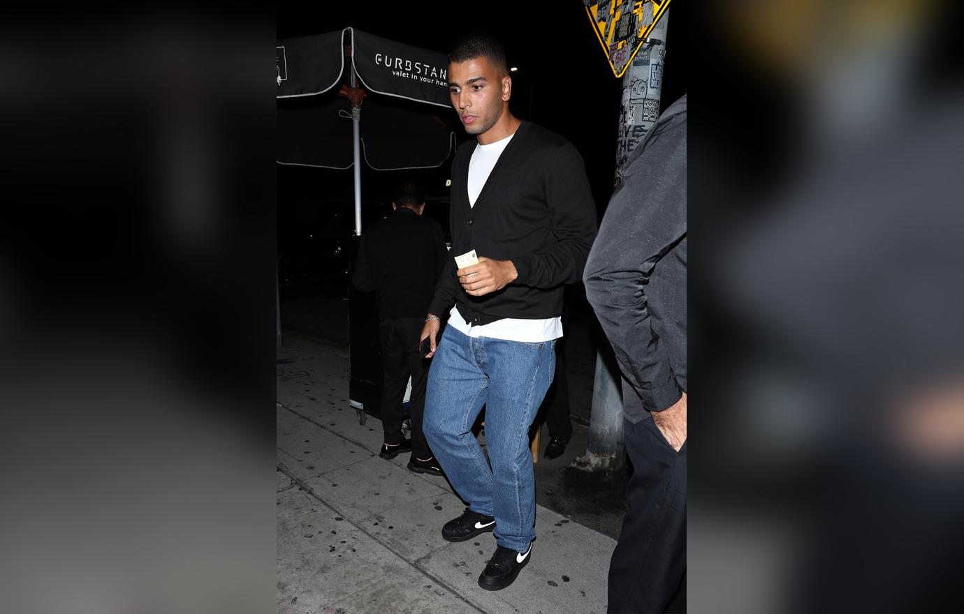 Kourtney Kardashian reunites with ex Younes Bendjima at the Nice Guy restaurant in West Hollywood.