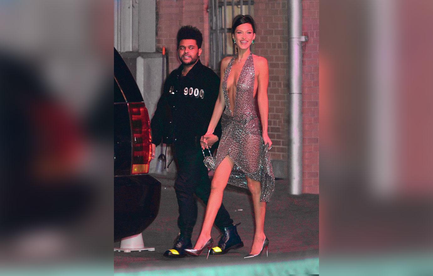 Bella Hadid And The Weeknd Take Late Night Pier Walk Photos