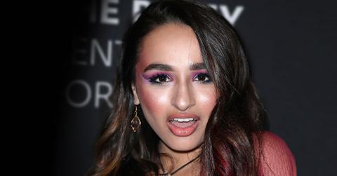 Jazz Jennings Whearing Purple Dress Looking At Camera