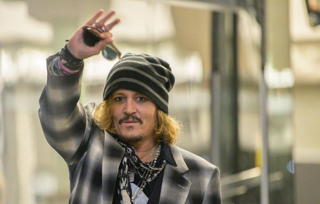 Fans Chant Johnny Depp Is 'Innocent' As Actor Takes The Stage