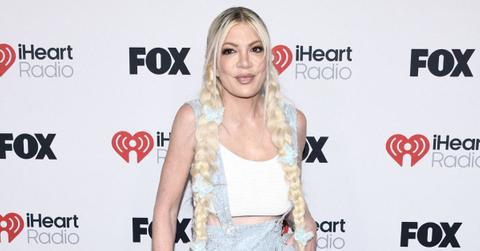 tori spelling new romance exec resembling dean mcdermott